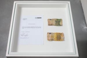 Cesare Pietroiusti, Eating Money, 2005, courtesy Galleria Michela Rizzo and the artist photo by Francesco Allegretto